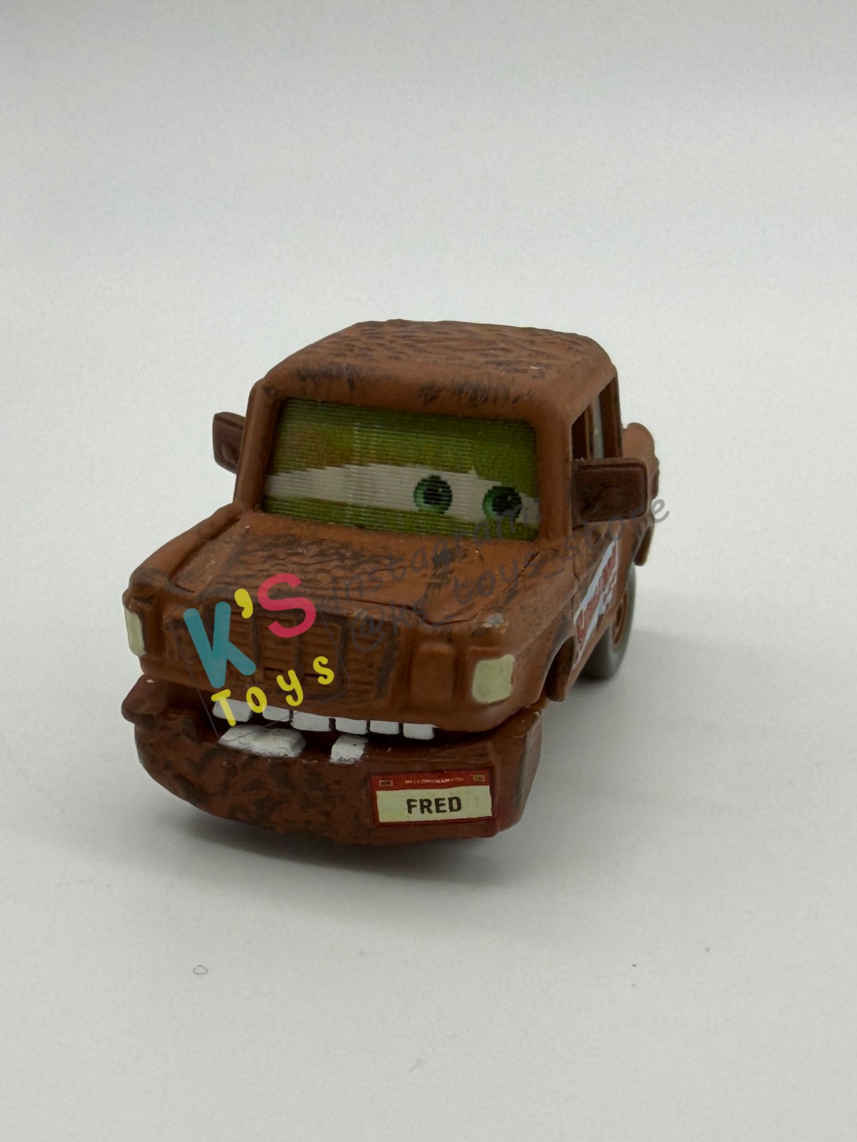 PRE-OWNED / LOOSE DISNEY PIXAR CARS 1:55 BY MATTEL - "FRED WITH FALLEN BUMPER (CHASE LENTICULAR)" CARS LENTICULAR EYES CHASE SERIES - NEAR MINT CONDITION