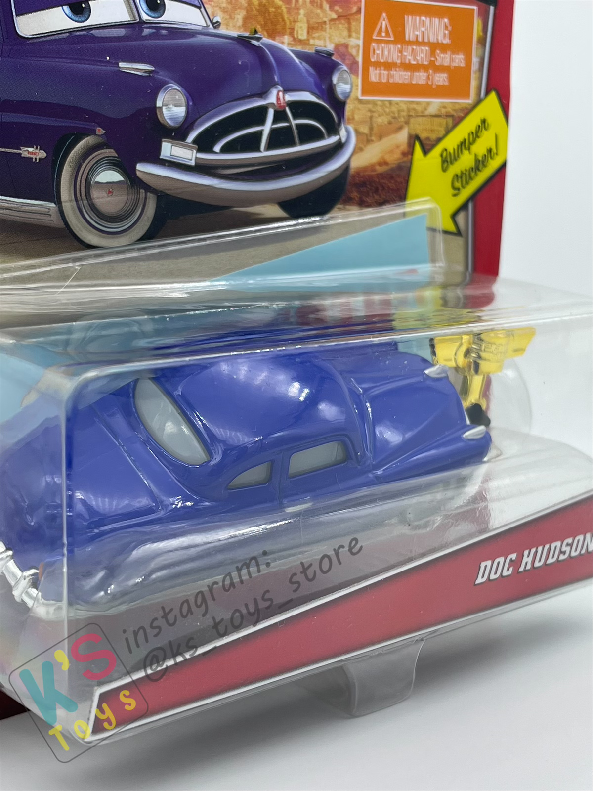 Disney Pixar Cars by MATTEL, DOC HUDSON, BONUS BUMPER STICKER AND PISTON CUP - WELCOME TO RADIATOR SPRINGS - BNIP