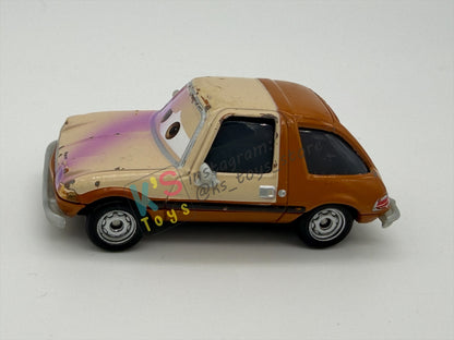 PRE-OWNED / LOOSE DISNEY PIXAR CARS - "TUBBS PACER WITH PAINT SPRAY" CARS 2 LEMONS SERIES - PLAYED CONDITION