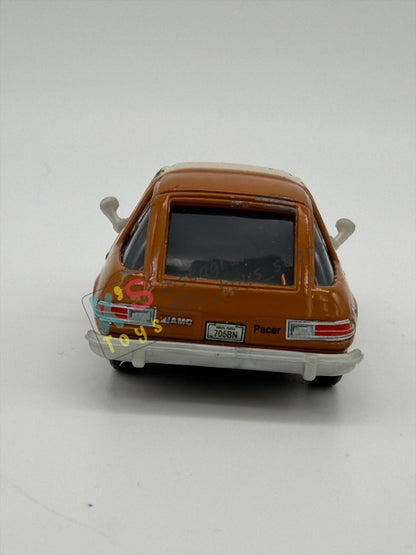 PRE-OWNED / LOOSE DISNEY PIXAR CARS - "TUBBS PACER WITH PAINT SPRAY" CARS 2 LEMONS SERIES - PLAYED CONDITION