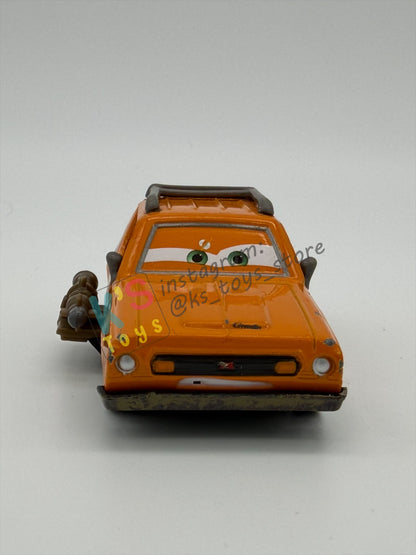 PRE-OWNED / LOOSE DISNEY PIXAR CARS - “GREM WITH WEAPON" - CARS 2 AIRPORT ADVENTURE SERIES - GOOD CONDITION