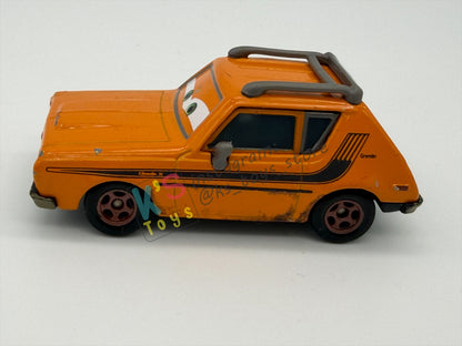 PRE-OWNED / LOOSE DISNEY PIXAR CARS - “GREM WITH WEAPON" - CARS 2 AIRPORT ADVENTURE SERIES - GOOD CONDITION