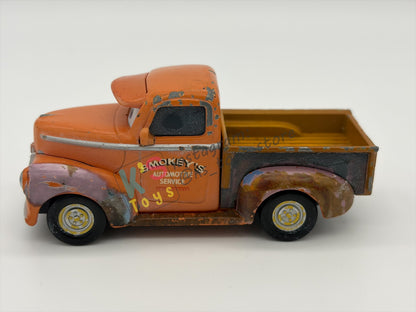 PRE-OWNED / LOOSE DISNEY PIXAR CARS - "SMOKEY (SHORT VARIANT)" CARS 3 THOMASVILLE SERIES - PLAYED CONDITION