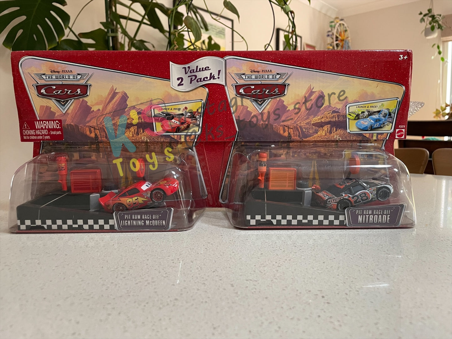 Disney Pixar Cars 1:55 by MATTEL, VALUE 2-PACK "PIT RACE-OFF LIGHTNING MCQUEEN CARS 1 AND NITROADE" LAUCNH AND RACE SERIES - RACE ORAMA - BNIP