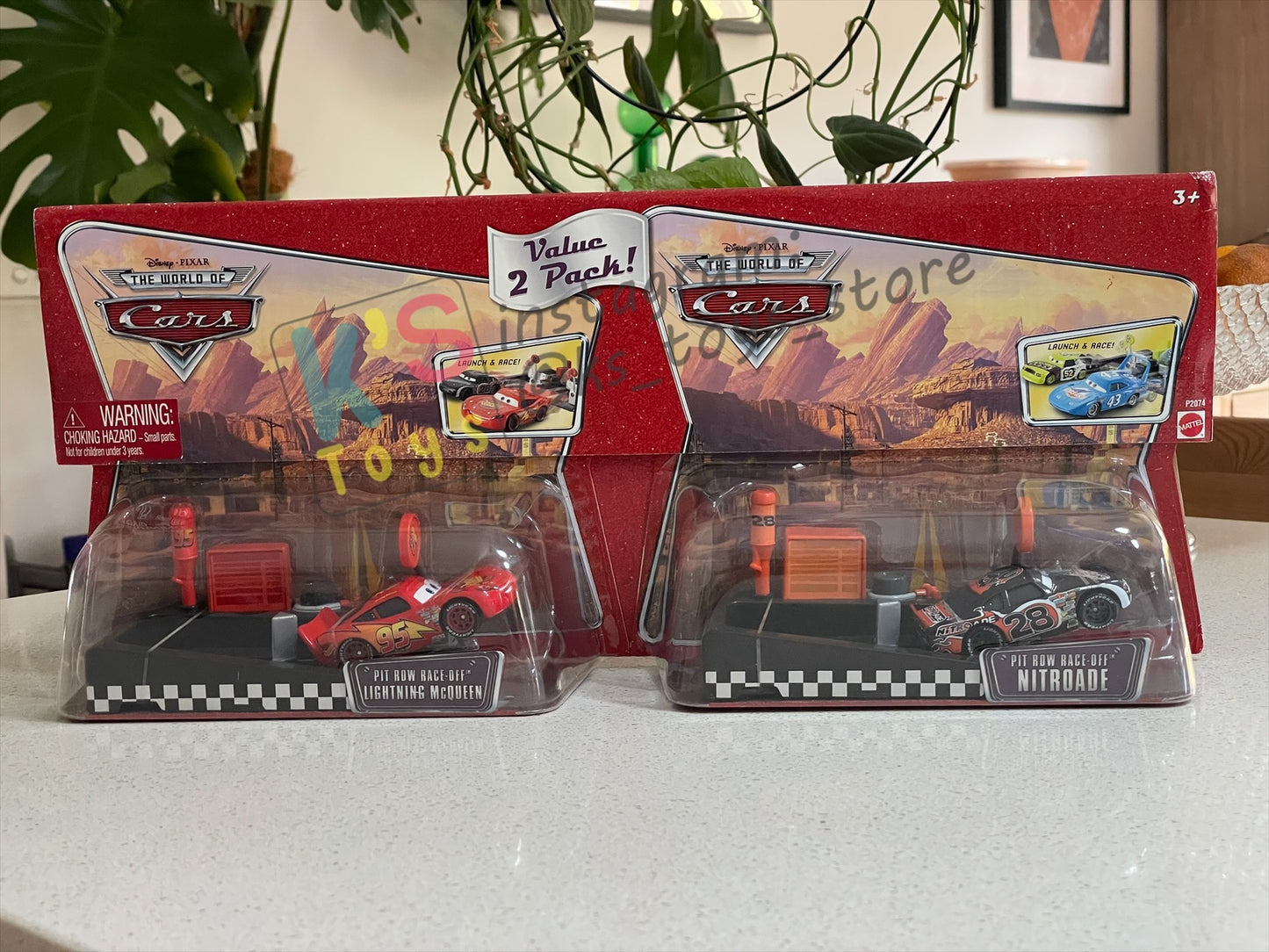 Disney Pixar Cars 1:55 by MATTEL, VALUE 2-PACK "PIT RACE-OFF LIGHTNING MCQUEEN CARS 1 AND NITROADE" LAUCNH AND RACE SERIES - RACE ORAMA - BNIP