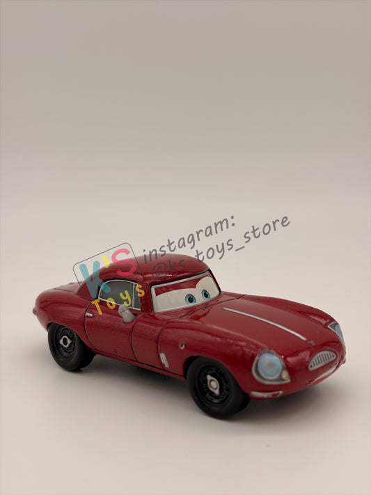 PRE-OWNED / LOOSE DISNEY PIXAR CARS - "LELAND TURBO" - CARS 2 SERIES - PRE-OWNED IN GOOD CONDITION