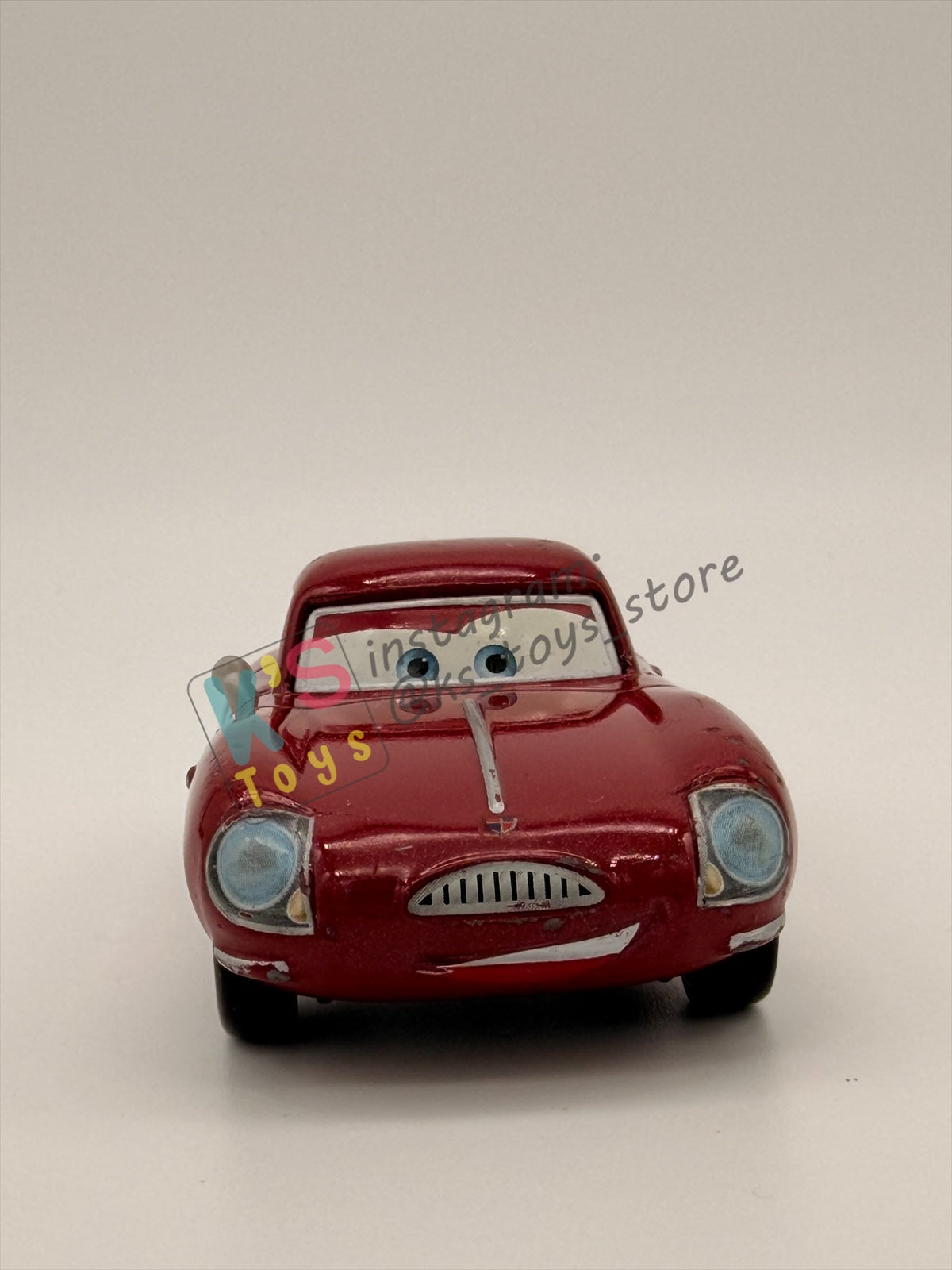 PRE-OWNED / LOOSE DISNEY PIXAR CARS - "LELAND TURBO" - CARS 2 SERIES - PRE-OWNED IN GOOD CONDITION