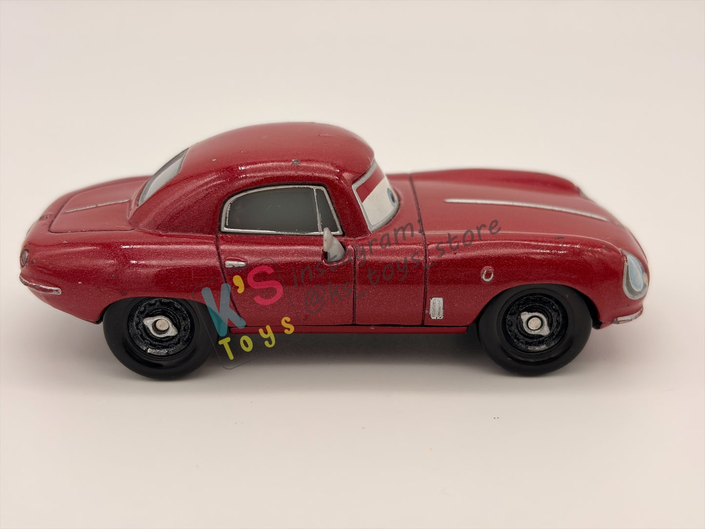 PRE-OWNED / LOOSE DISNEY PIXAR CARS - "LELAND TURBO" - CARS 2 SERIES - PRE-OWNED IN GOOD CONDITION
