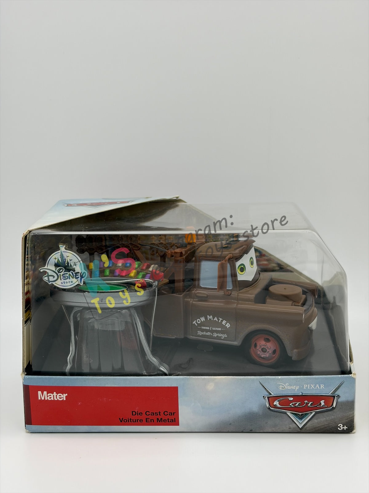 Disney Store Version of Disney Pixar Cars 1:43 - MATER WITH STADIUM/RACE-TRACK HAT - BNIP