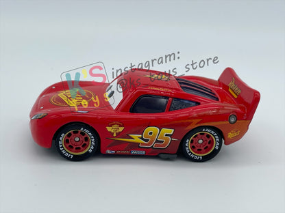 PRE-OWNED / LOOSE DISNEY PIXAR CARS 1:55 BY MATTEL - "HUDSON HORNET PISTON CUP LIGHTNING MCQUEEN" CARS 2 SERIES - NEAR MINT CONDITION