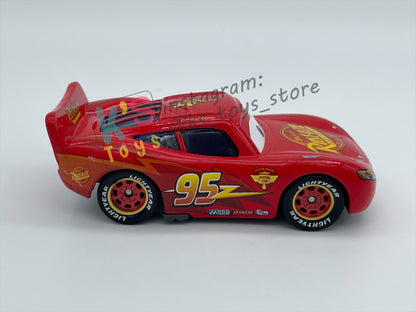 PRE-OWNED / LOOSE DISNEY PIXAR CARS 1:55 BY MATTEL - "HUDSON HORNET PISTON CUP LIGHTNING MCQUEEN" CARS 2 SERIES - NEAR MINT CONDITION
