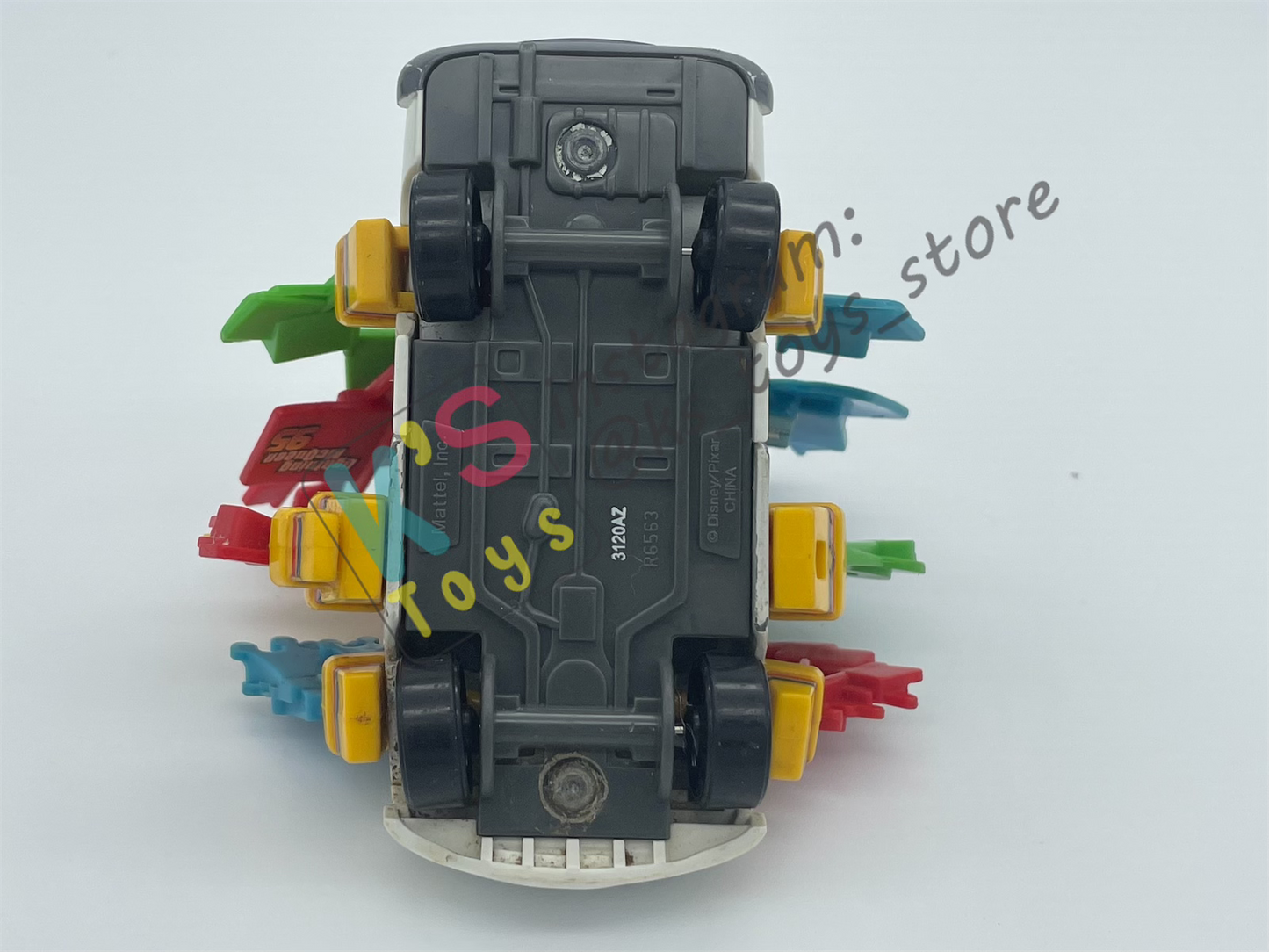 PRE-OWNED / LOOSE DISNEY PIXAR CARS - "BRIAN MOTOR SPARK - SOUVENIRS GUY" - CARS 1 SERIES, MEGA SIZE - PLAYED CONDITION