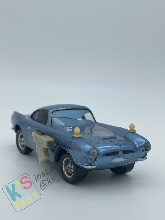 PRE-OWNED / LOOSE DISNEY PIXAR CARS - "FINN MCMISSILE WITH WEAPON" - CARS 2 MOVIE MOMENTS SERIES - PLAYED CONDITION