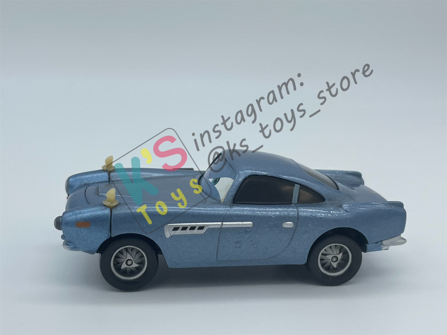 PRE-OWNED / LOOSE DISNEY PIXAR CARS - "FINN MCMISSILE WITH WEAPON" - CARS 2 MOVIE MOMENTS SERIES - PLAYED CONDITION